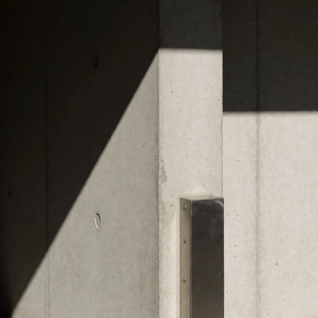 Brutalist concrete architectural detail with angular shadows